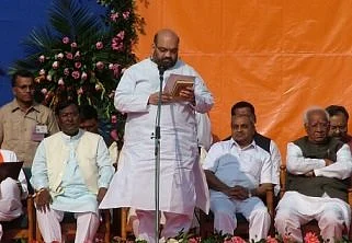 Amit Shah was sworn in as a minister for the first time in 2002.