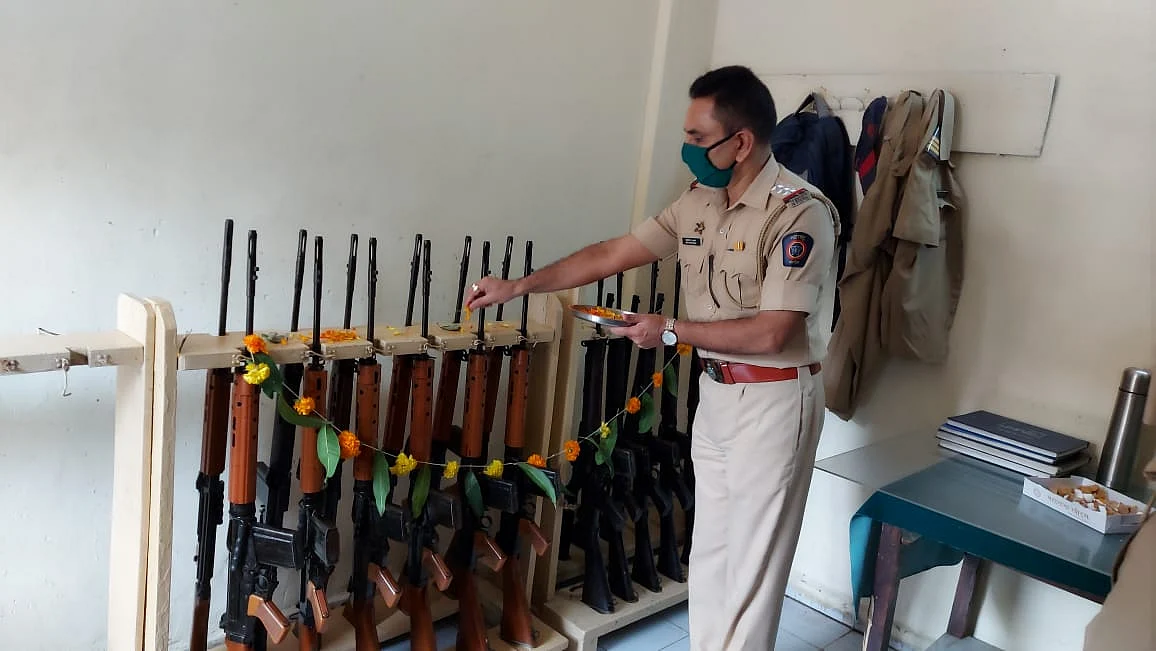 Mira Bhayandar: Cops, Covid-warriors worship the 'other shastra', perform puja on guns, medical equipment