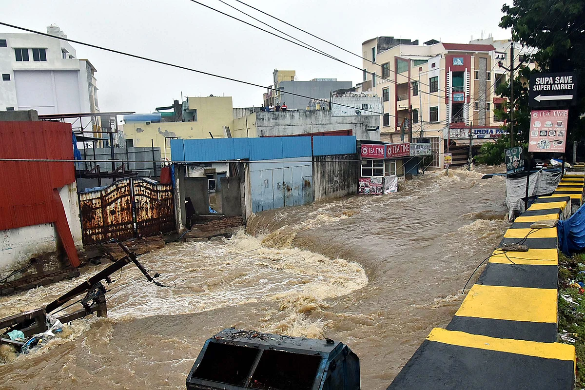 Watch: Man swept away, cars damaged as torrential rain batters Hyderabad