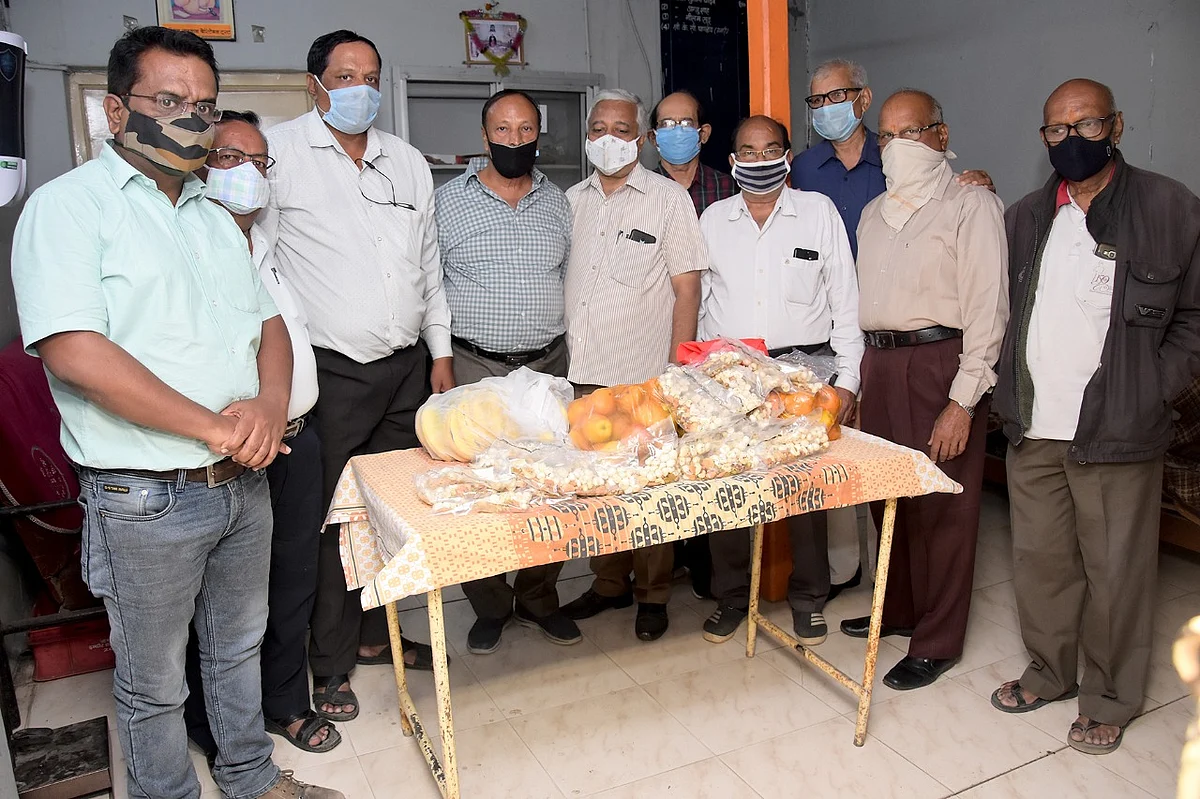 NGO members donating immunity boosting kits