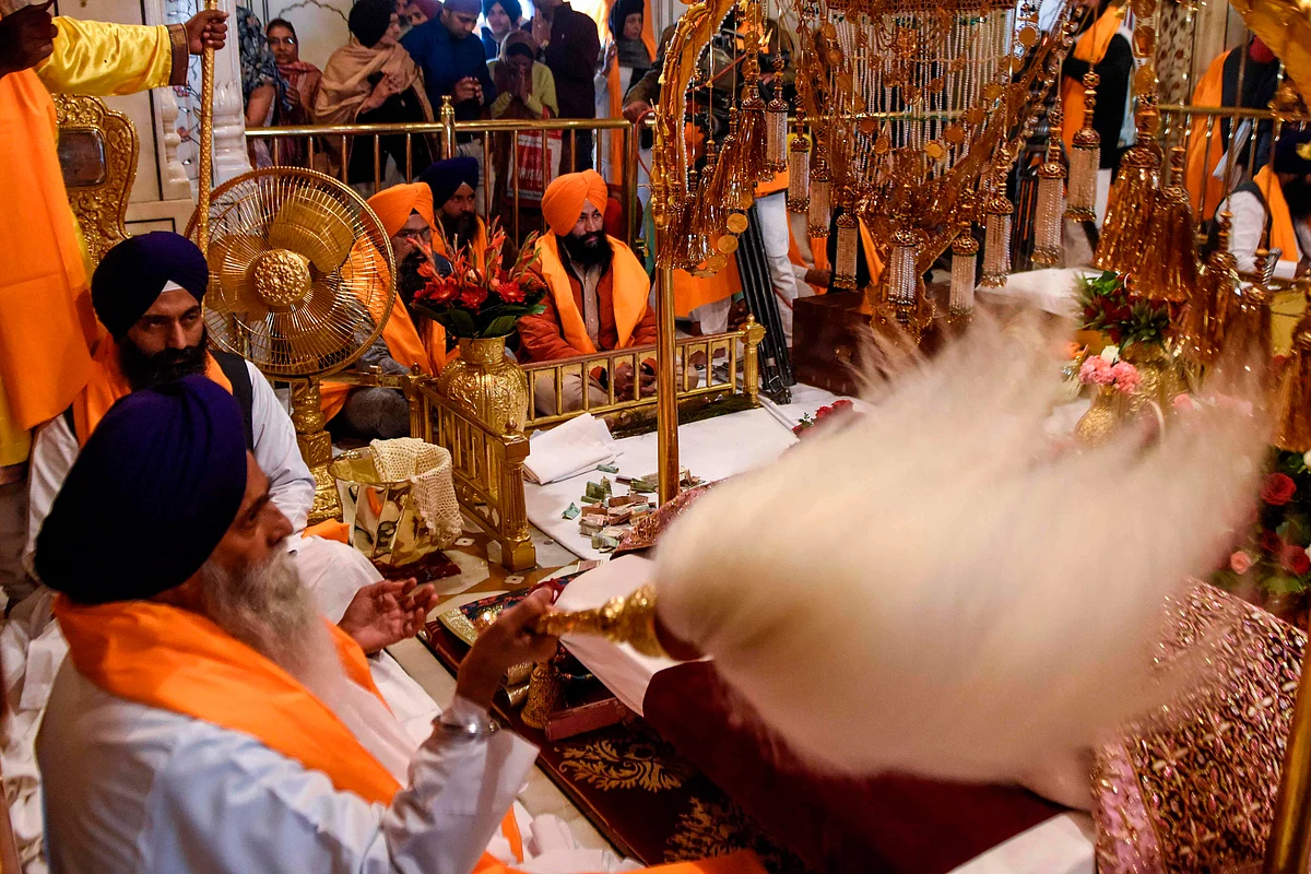 In pics: Devotees offer prayers at Golden Temple on Guru Nanak Jayanti