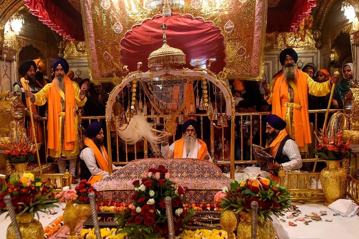 In pics: Devotees offer prayers at Golden Temple on Guru Nanak Jayanti