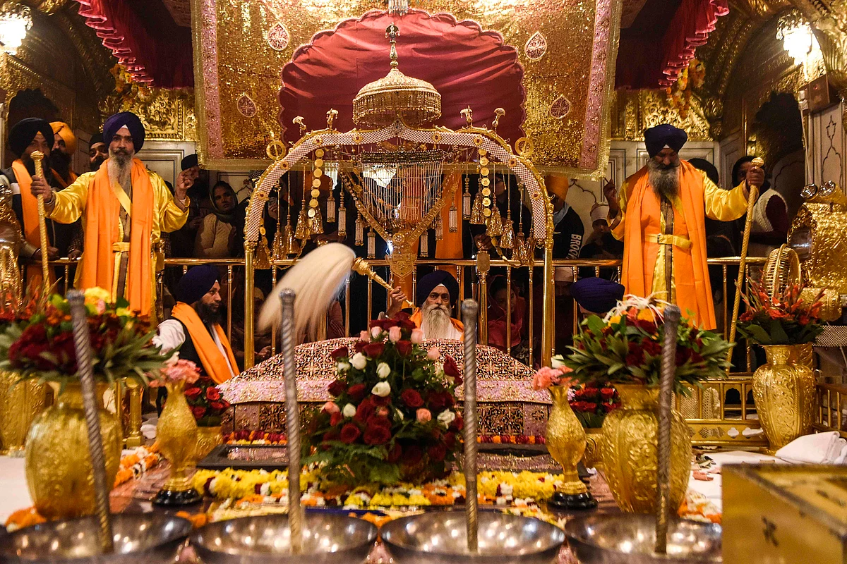 In pics: Devotees offer prayers at Golden Temple on Guru Nanak Jayanti