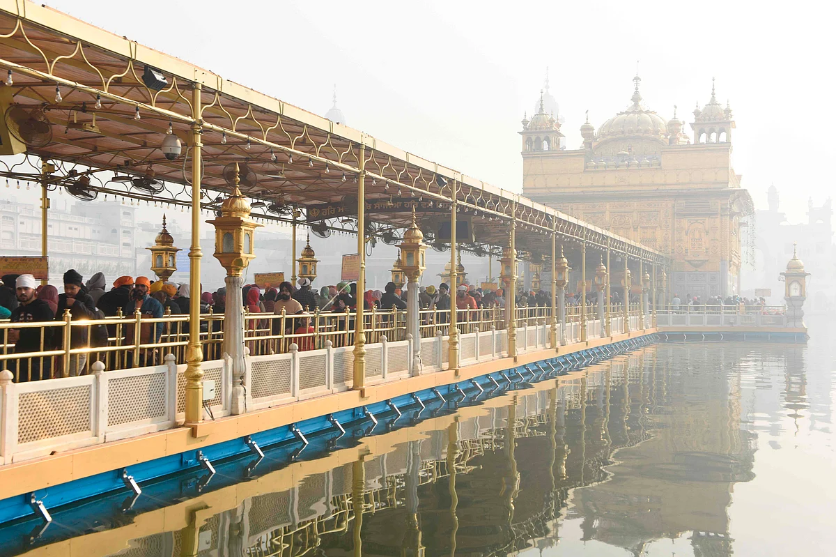 In pics: Devotees offer prayers at Golden Temple on Guru Nanak Jayanti