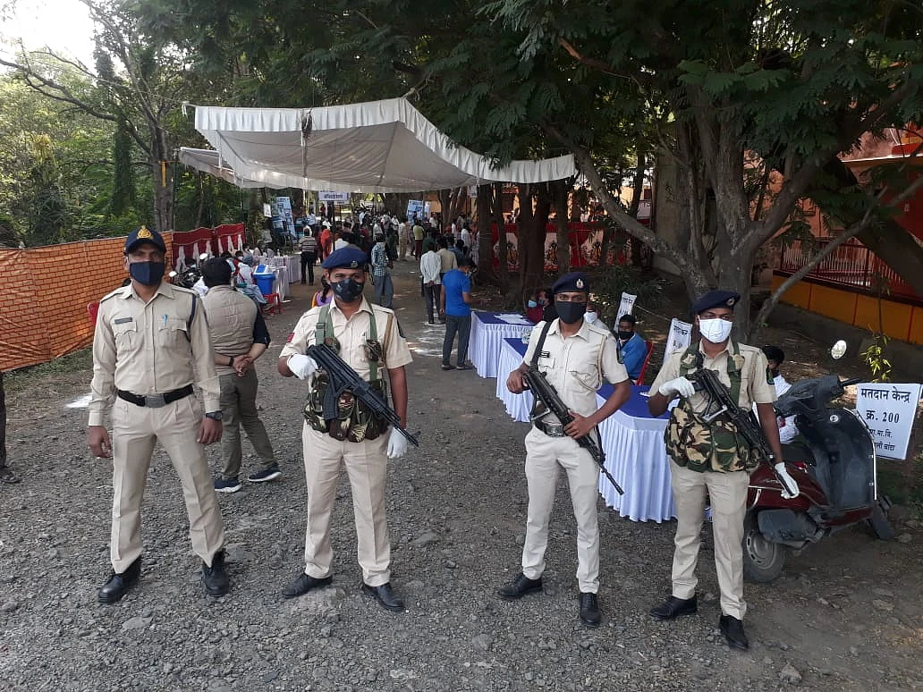 MP Bypolls: Battling coronavirus fear, voters cast votes; last hour reserved for COVID-19 patients