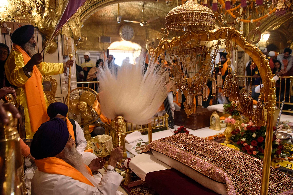 In pics: Devotees offer prayers at Golden Temple on Guru Nanak Jayanti