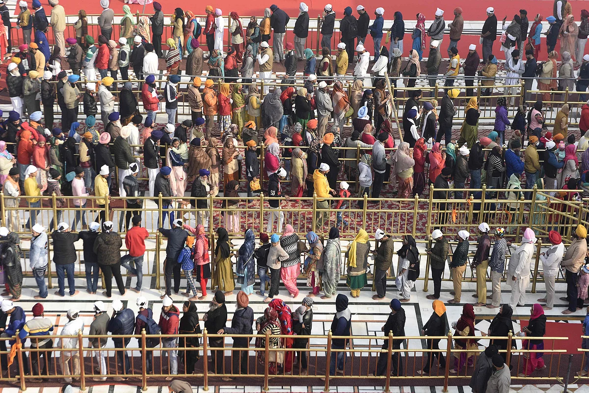 In pics: Devotees offer prayers at Golden Temple on Guru Nanak Jayanti