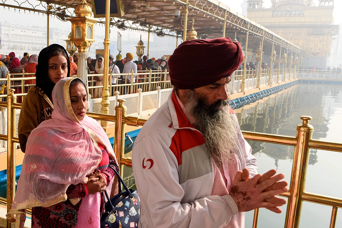 In pics: Devotees offer prayers at Golden Temple on Guru Nanak Jayanti