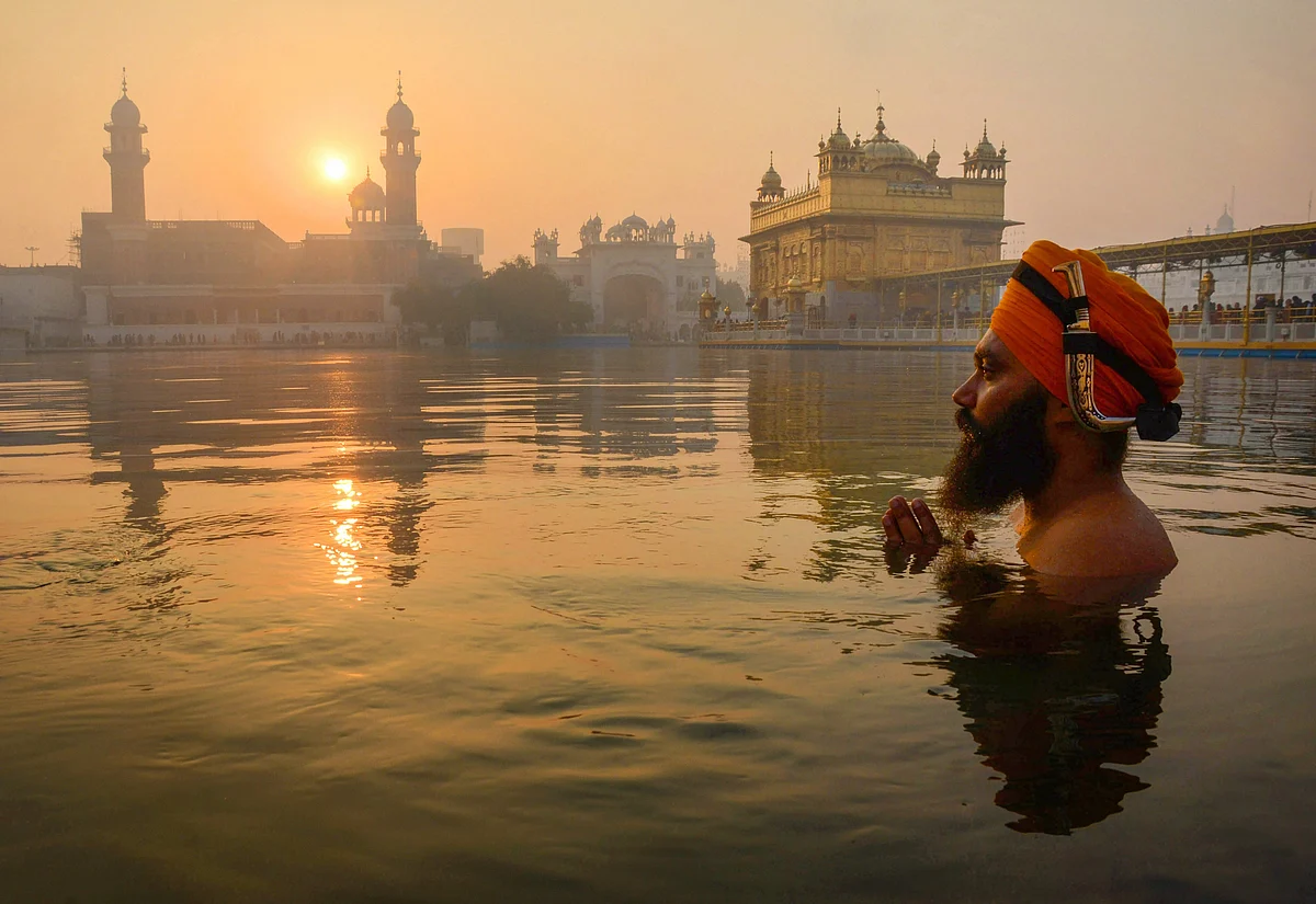 In pics: Devotees offer prayers at Golden Temple on Guru Nanak Jayanti