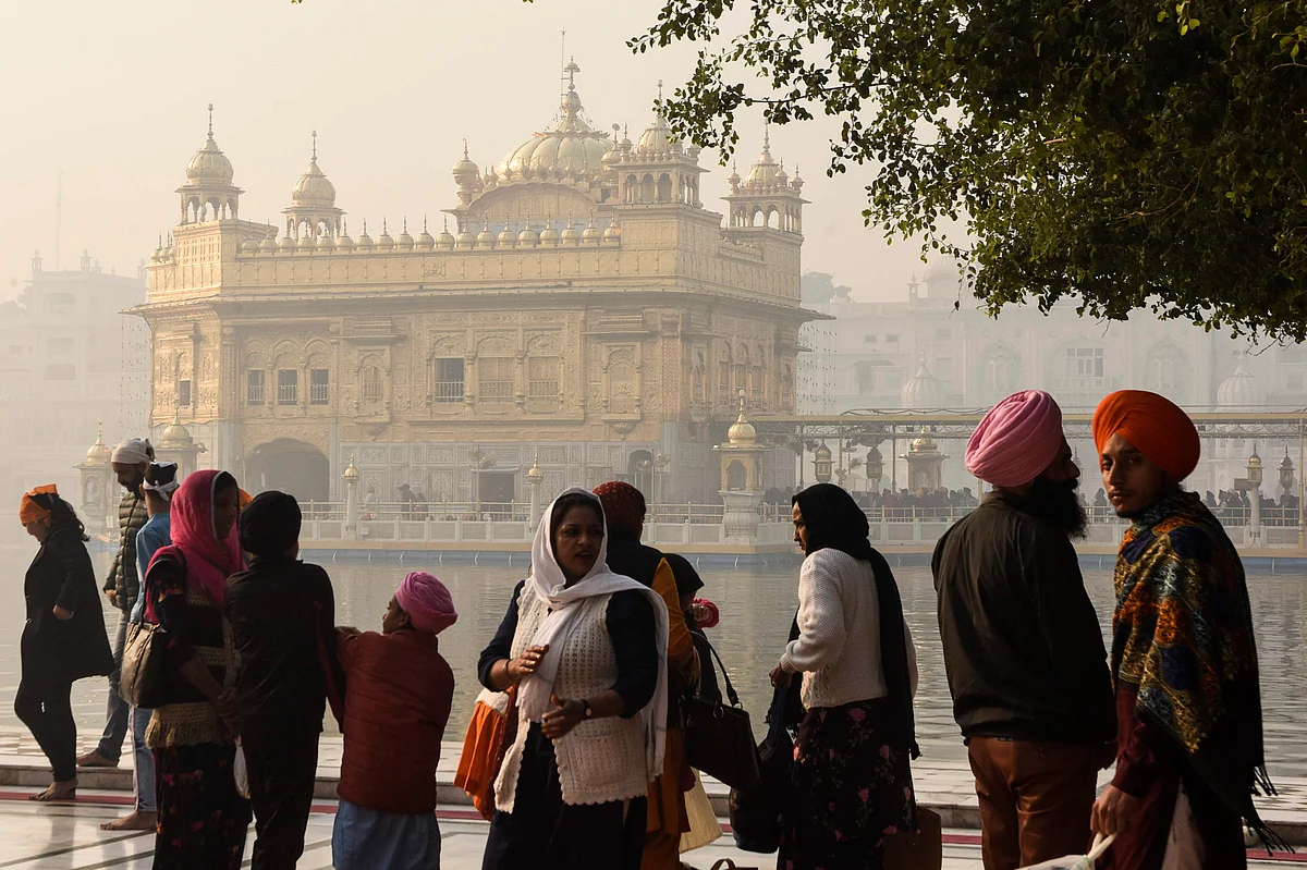 In pics: Devotees offer prayers at Golden Temple on Guru Nanak Jayanti