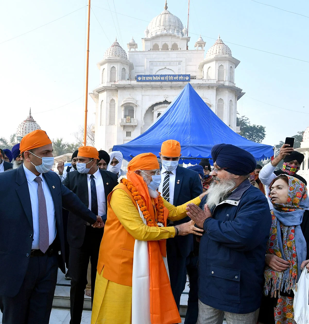 Prime Minister Narendra Modi meets people as he visits Gurudwara Rakab Ganj Sahib on the occasion of the 400th Prakash Parv of Guru Teg Bahadur, in New Delhi on Sunday