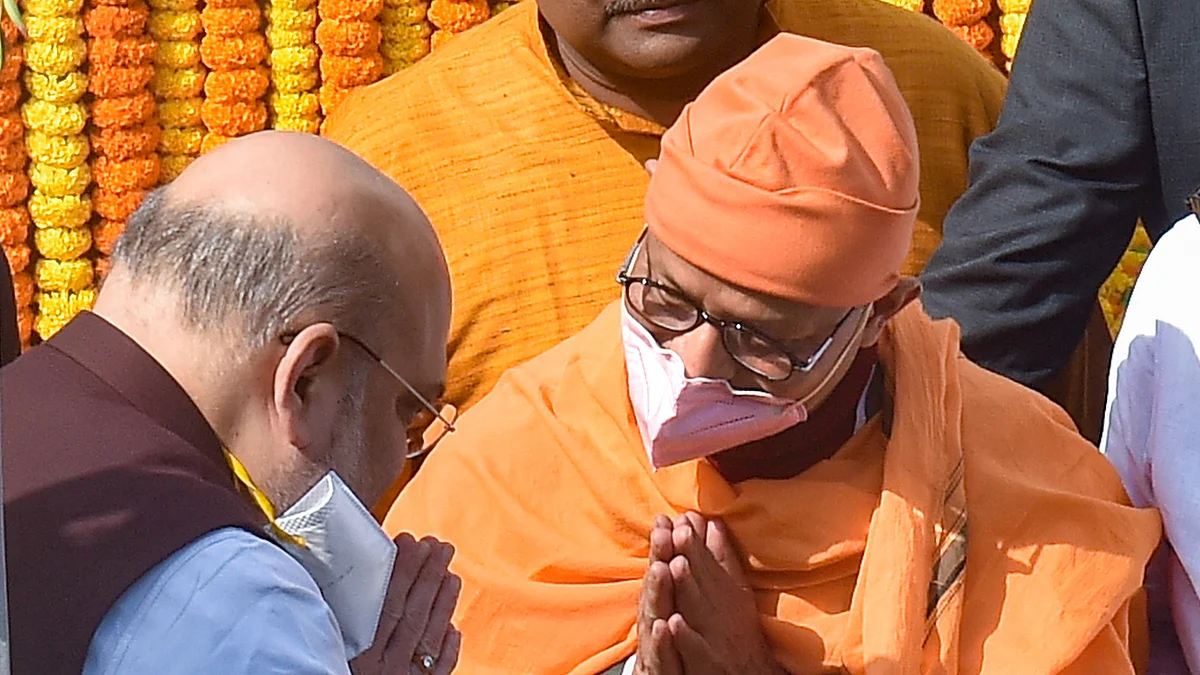 Kolkata: Union Home Minister Amit Shah greets a hermit of Ramkrishna Mission during his visit to Swami Vivekanandas ancestral house, in Kolkata, Saturday, Dec. 19, 2020.