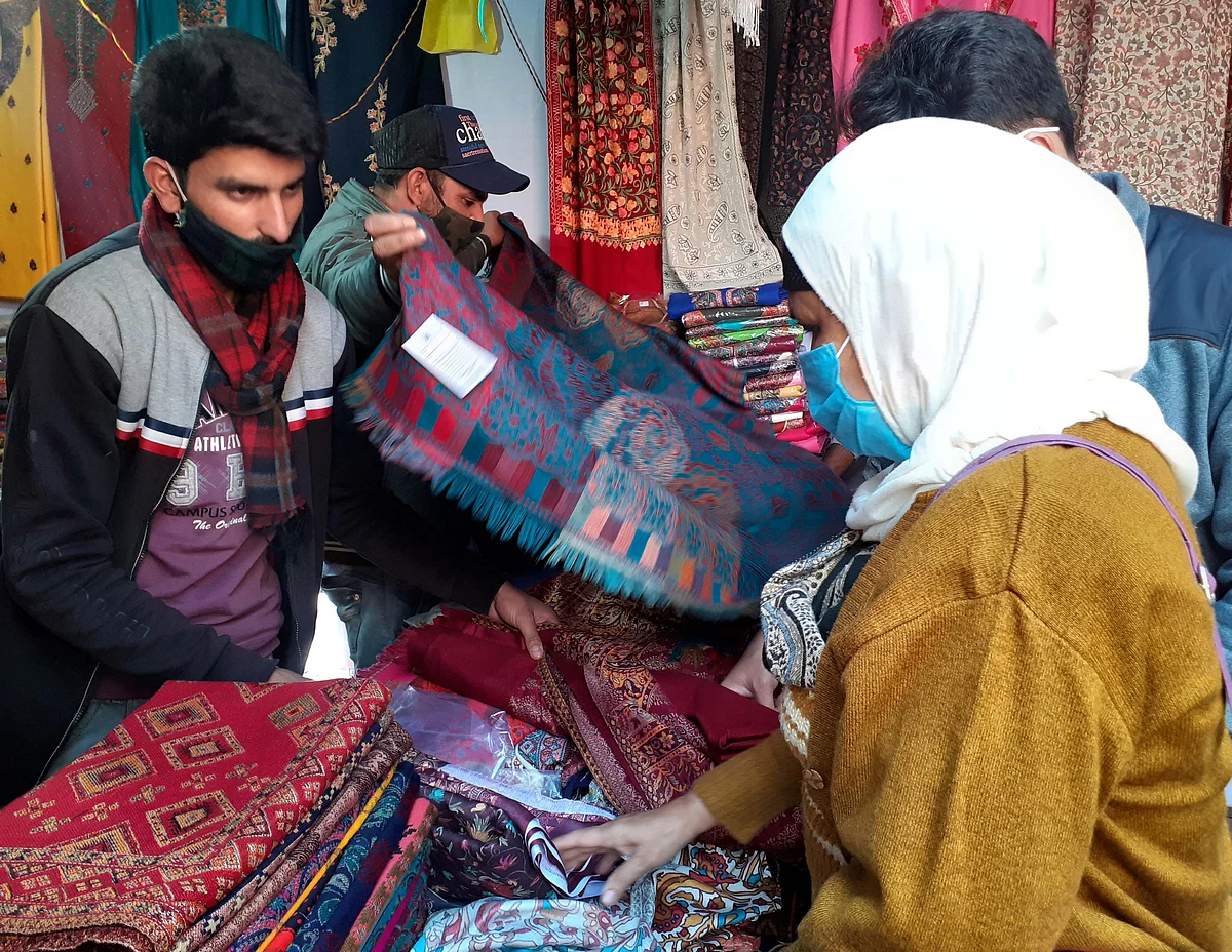 Artisans showing Pashmina Shawls on J&K stall at Gauhar Mahal.