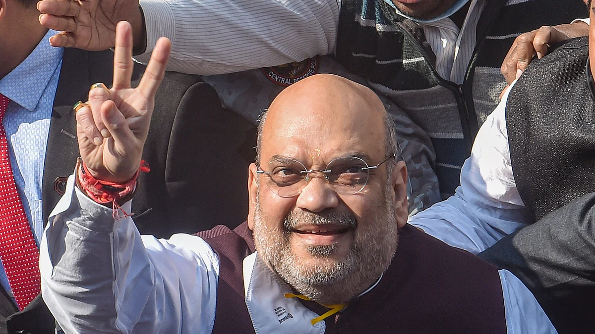 Kolkata: Union Home Minister Amit Shah flashes victory sign during his visit to Swami Vivekanandas ancestral house, in Kolkata, Saturday, Dec. 19, 2020.