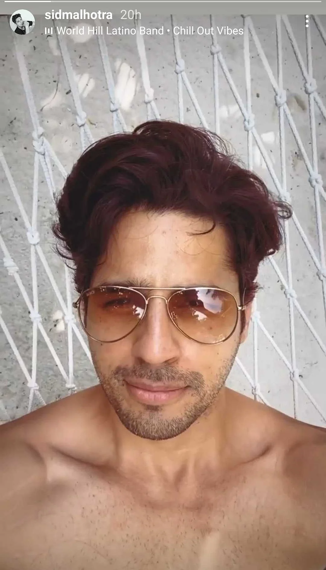 Kiara Advani flaunts her midriff in a strapless bikini while sunbathing in the Maldives