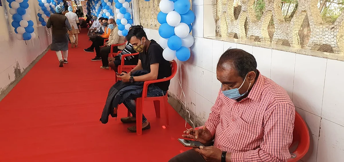 Beneficiaries wait for their turn at vaccination centre at ESIC hospital