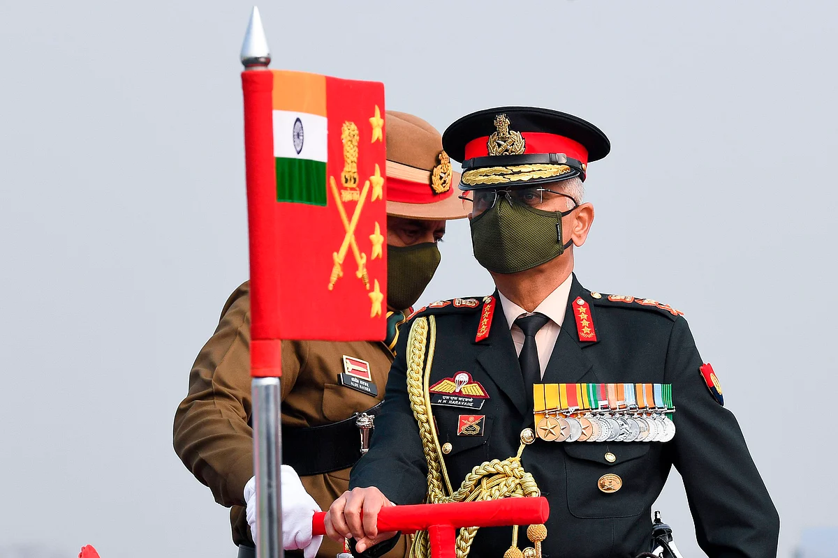 Chief of Army Staff General Manoj Mukund Naravane reviews a parade during a ceremony to celebrate Indias 73rd Army Day in New Delhi on January 15, 2021. (Photo by Prakash SINGH / AFP)