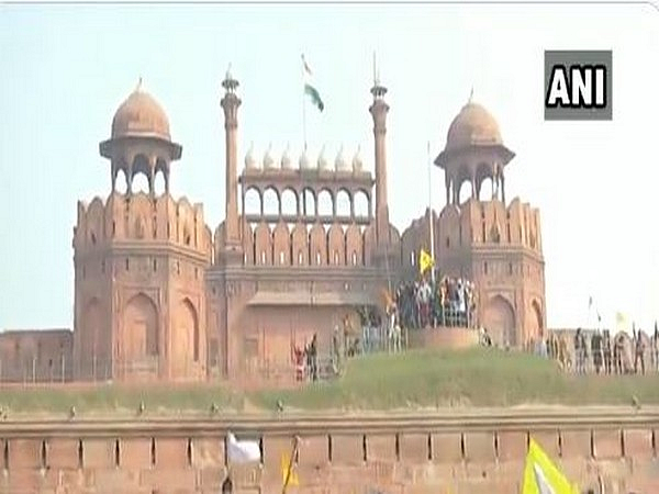 In Pics: Protesting farmers breach Red Fort, put up union flag, 'Nishan Sahib' at lower rampant