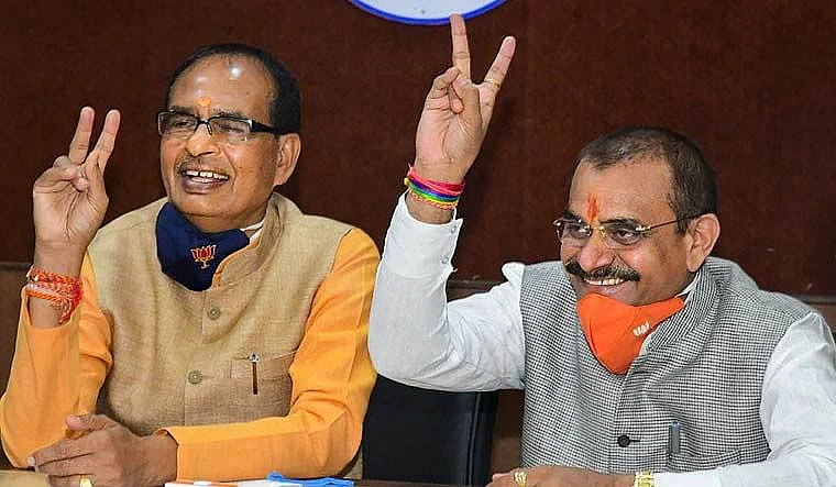 BJP's MP chief VD Sharma with Chief Minister Shivraj Singh Chouhan