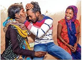 Ankit Kumar Singh greets mother at his home in Baruhatu village in Latehar of Jharkhand. Ankit and 3 others safely returned home.