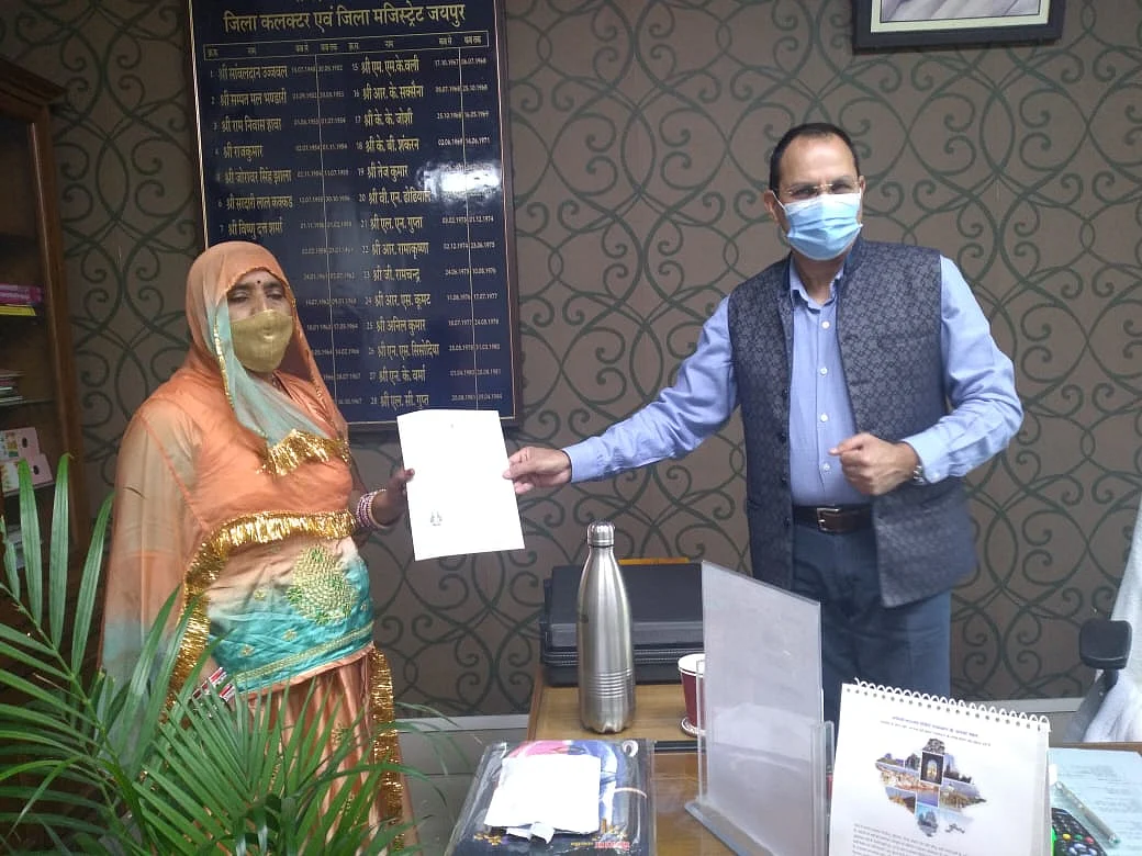 Jaipur district collector Antar Singh Nehra grants Indian citizenship to Pakistani Hindu refugees in Jaipur on Friday.