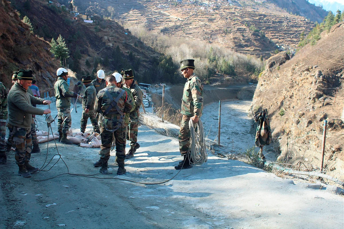 Rescue operations underway after a glacier broke off in Joshimath causing a massive flood in the Dhauli Ganga river, in Chamoli district of Uttarakhand, Sunday, Feb. 7, 2021.