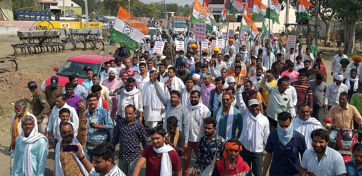 Hundreds of party workers and farmers participated in Congress protest march in Dhar district on Monday