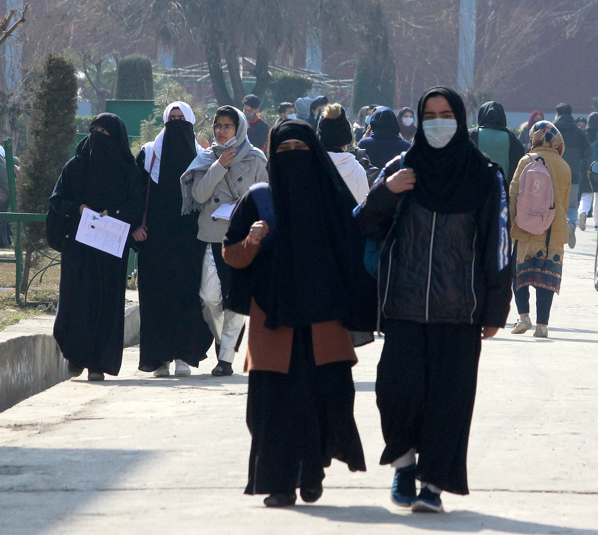 Students arrive at a Government college as the Colleges reopened after almost 11 months of break due to the Covid-19 coronavirus pandemic in Srinagar, Kashmir on February 15, 2021.