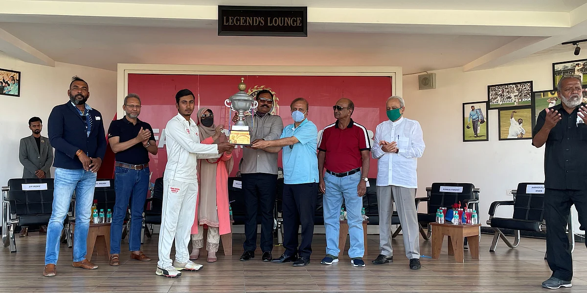 SM Khan cricket trophy being presented to winner