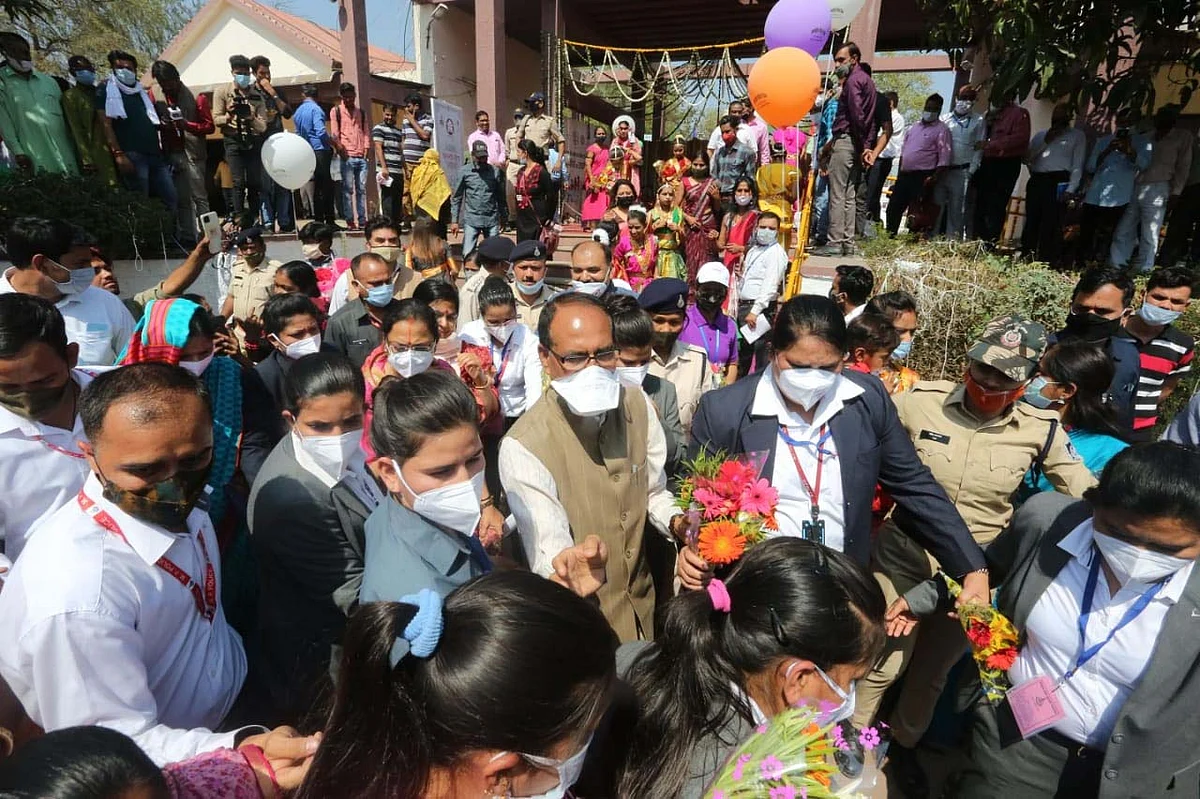 Women security officers escort Chief Minister Shivraj Singh Chouhan at Bhopal Haat on International Women’s Day on Monday.