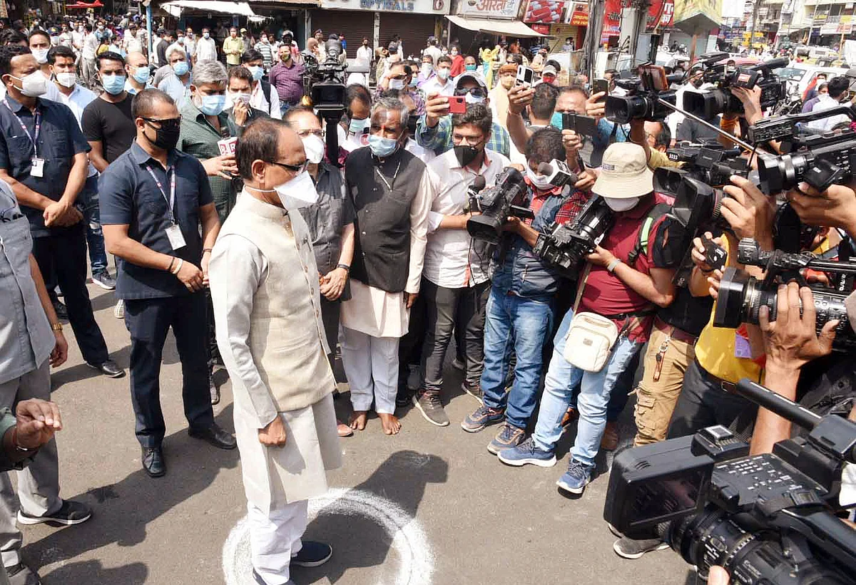 Madhya Pradesh Chief Minister Shivraj Singh Chouhan observes two-minute silence during the launch of a statewide campaign My Mask My Security to sensitize people regarding the coronavirus safety norms in Bhopal on Tuesday.