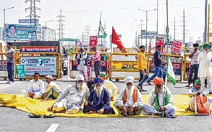 Farmers at Ghazipur at the Delhi-UP border on Friday.