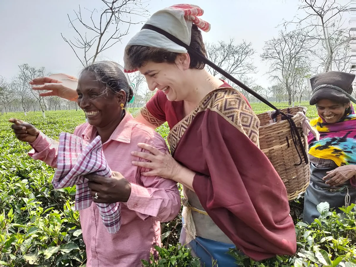 Priyanka Gandhi Vadra sharing a laugh with tea plantation workers at the Sadharu Estate, Biswanath, Assam.