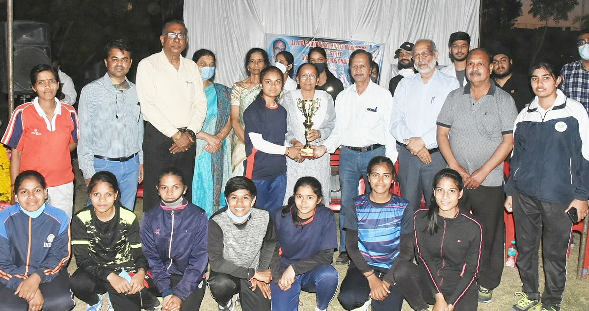 Winners with softball trophy