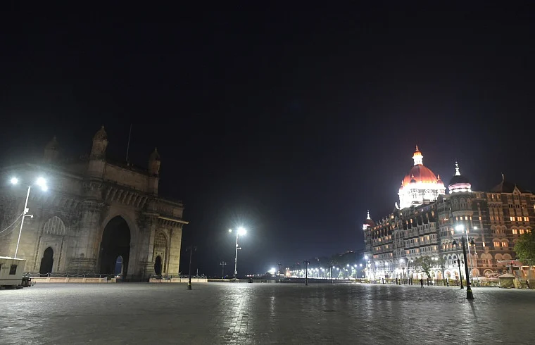 Tourist spot Gateway of India and the Taj Mahal Palace hotel wore a deserted look