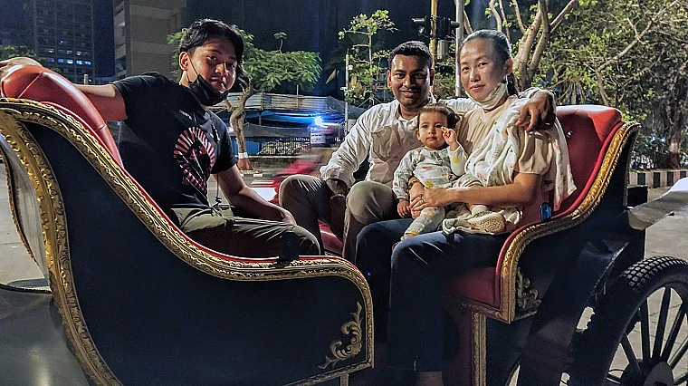 The Nevis Family - Mark Khayi, Joshua, Grace and Victoria Nevis (from left) after an exhilarating ride at Marine Drive