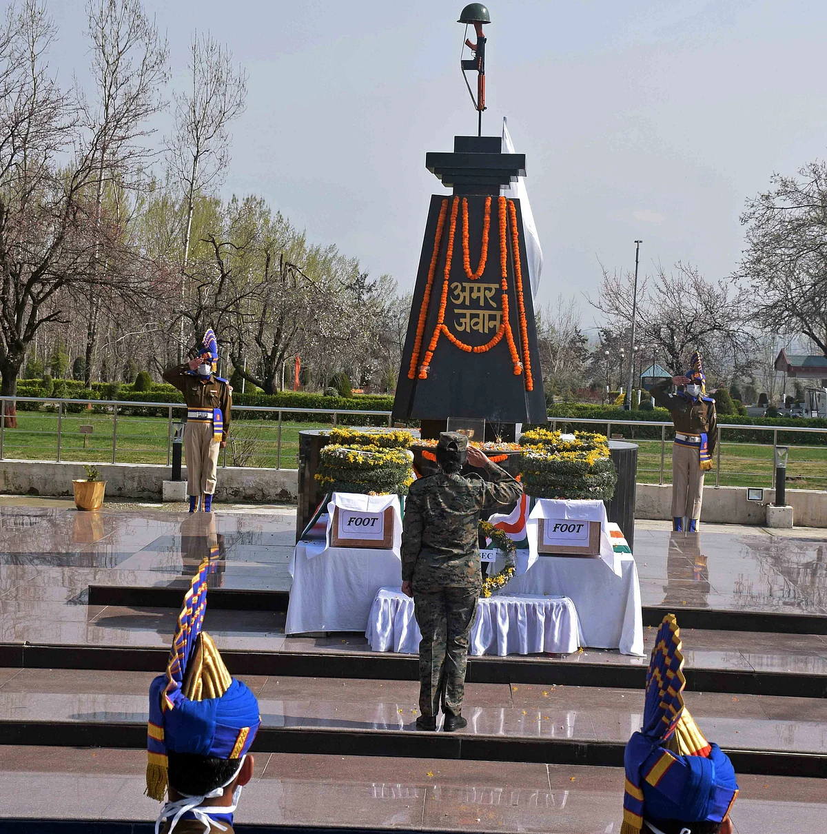 IG CRPF Kashmir lay floral wreath at the coffin of slain CRPF at Special Training Camp in Humhama area of Budgam.