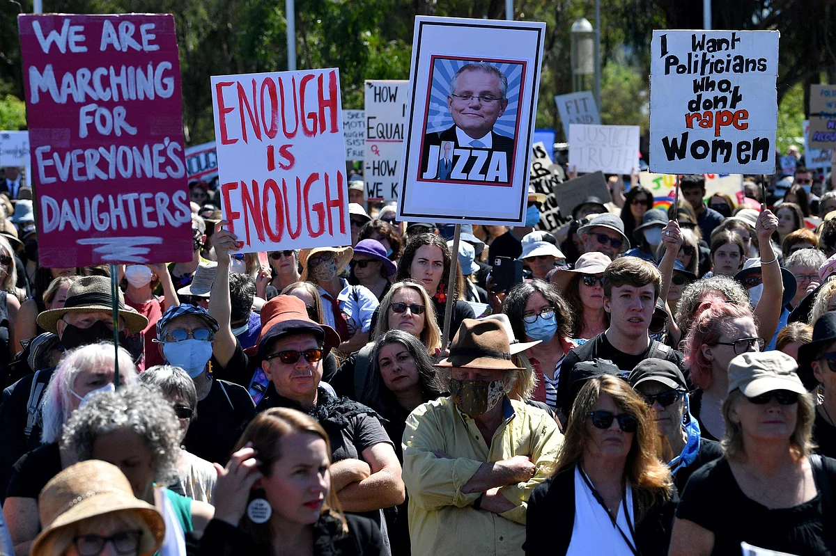Protesters attend a rally against sexual violence and gender inequality in Australias capital city Canberra on March 15, 2021.