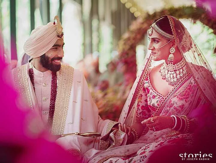 Indian pacer Jasprit Bumrah ties the knot with sports presenter Sanjana Ganesan - check out pics here