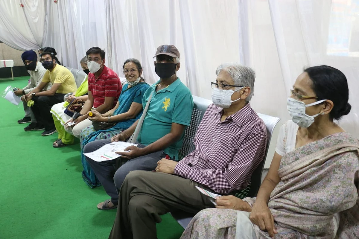 Senior citizens await their turn for inoculation at PC Sethi Hospital in Indore on Monday