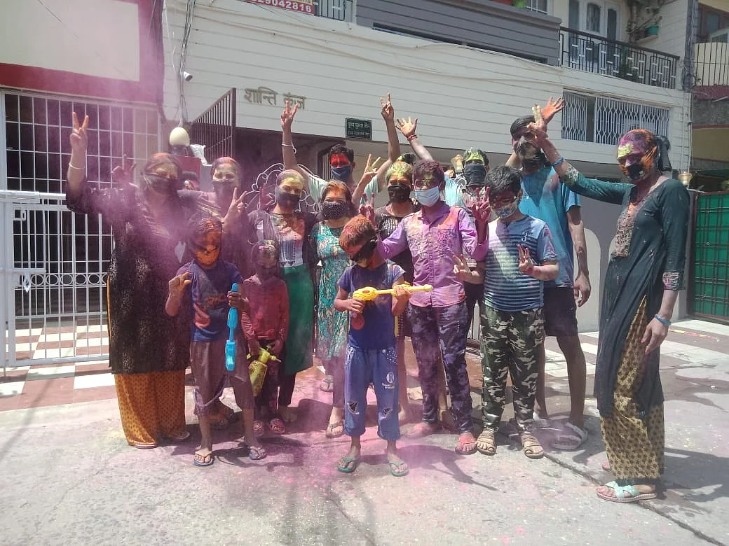 Family poses for Holi photo in New Market, Bhopal