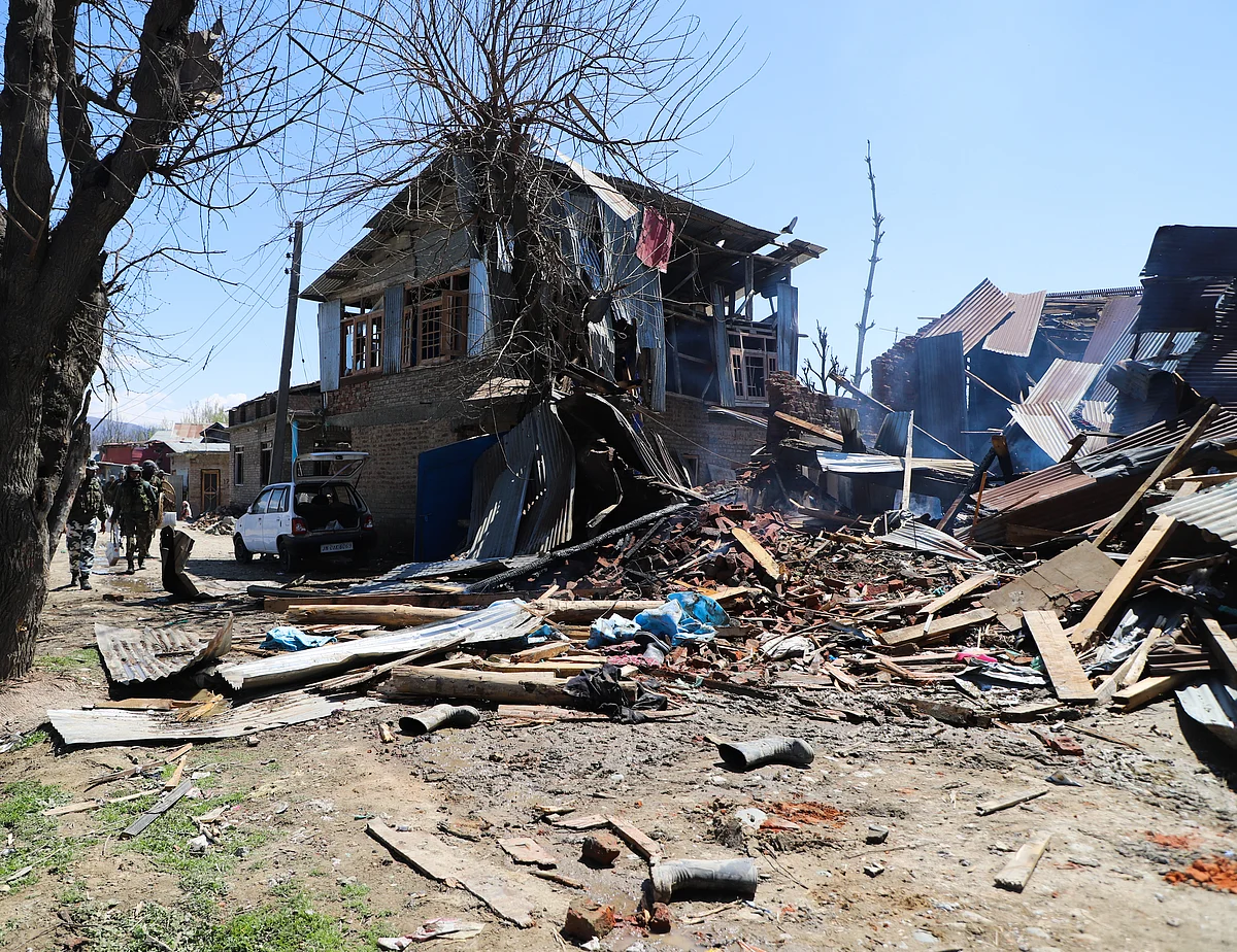 A house destroyed during an encounter between suspected militants and security forces in Pulwama district of South Kashmir.