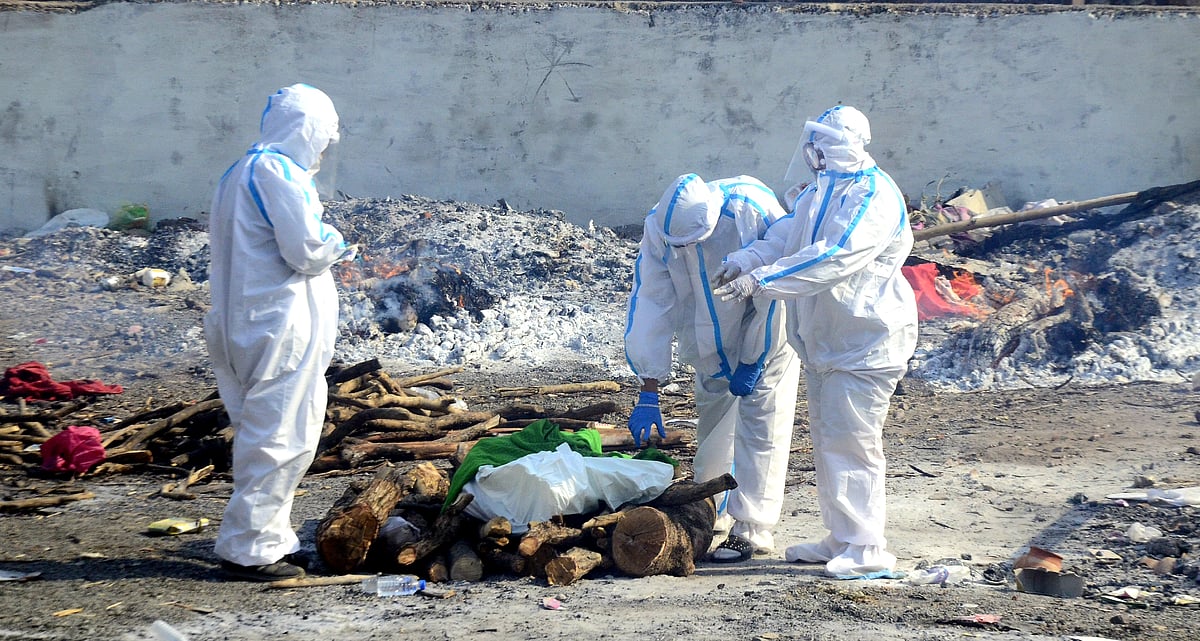 A Covid patient's body being cremated at the Bhadbhada crematorium on Tuesday.