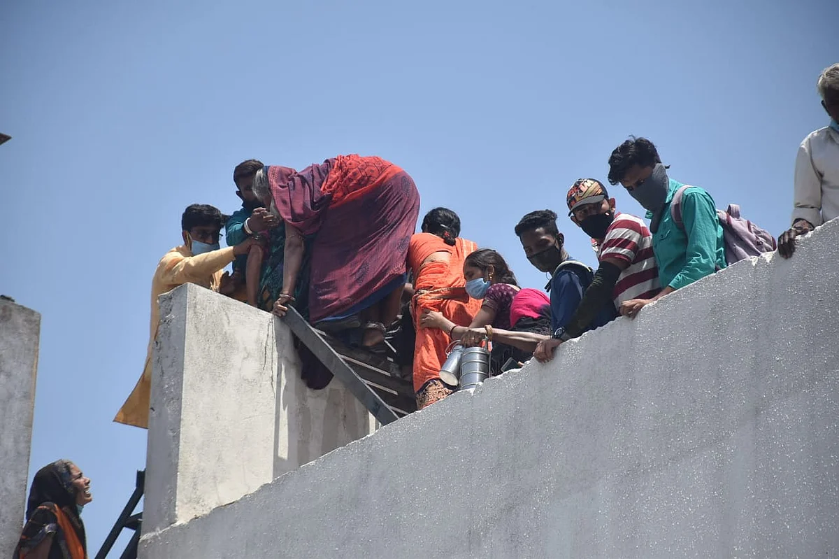 A woman jumps to next building after fire broke at Patidar hospital on Sunday