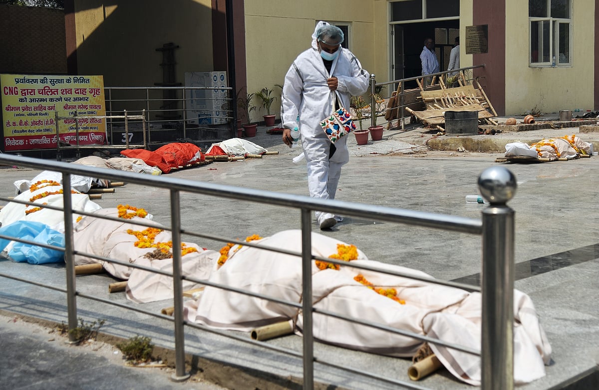 A view of Subhash Nagar Crematorium where a long queue of Bodies of COVID-19 victims wait for cremation in New Delhi on Tuesday. 