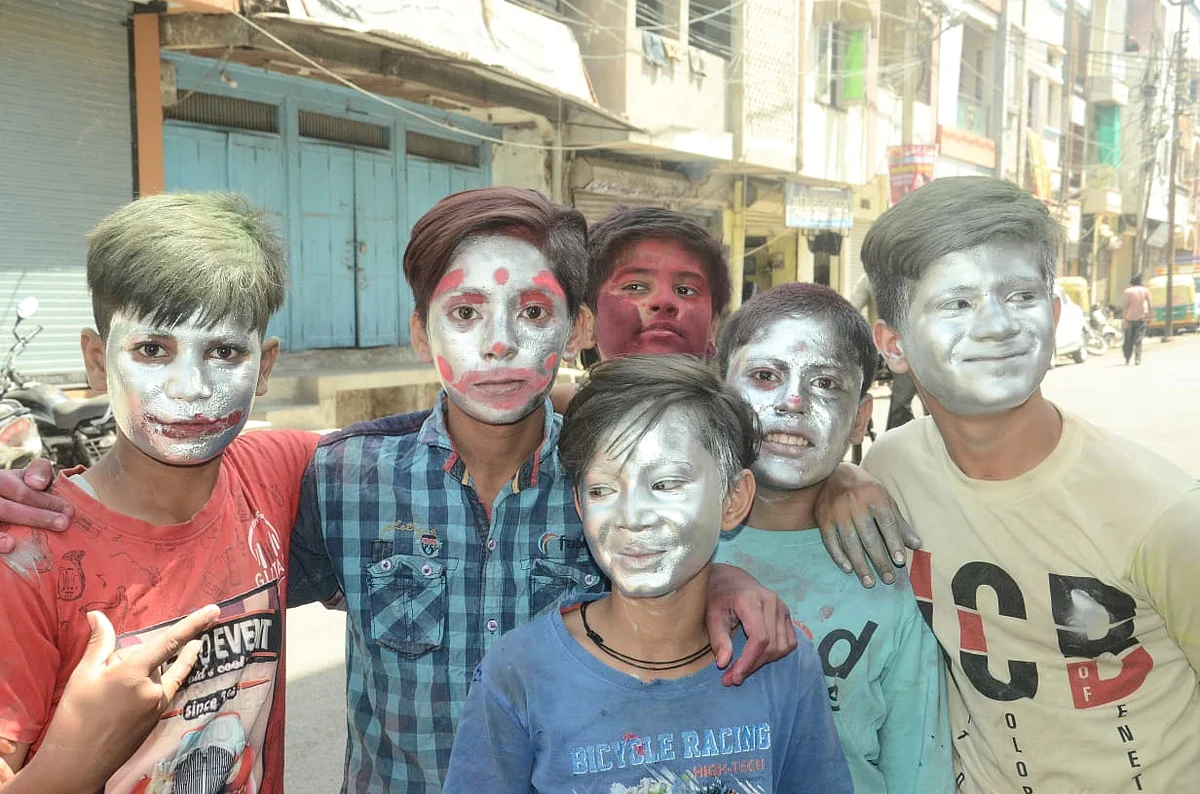 Children with silver paint on Rangpanchami in Ujjain on Friday