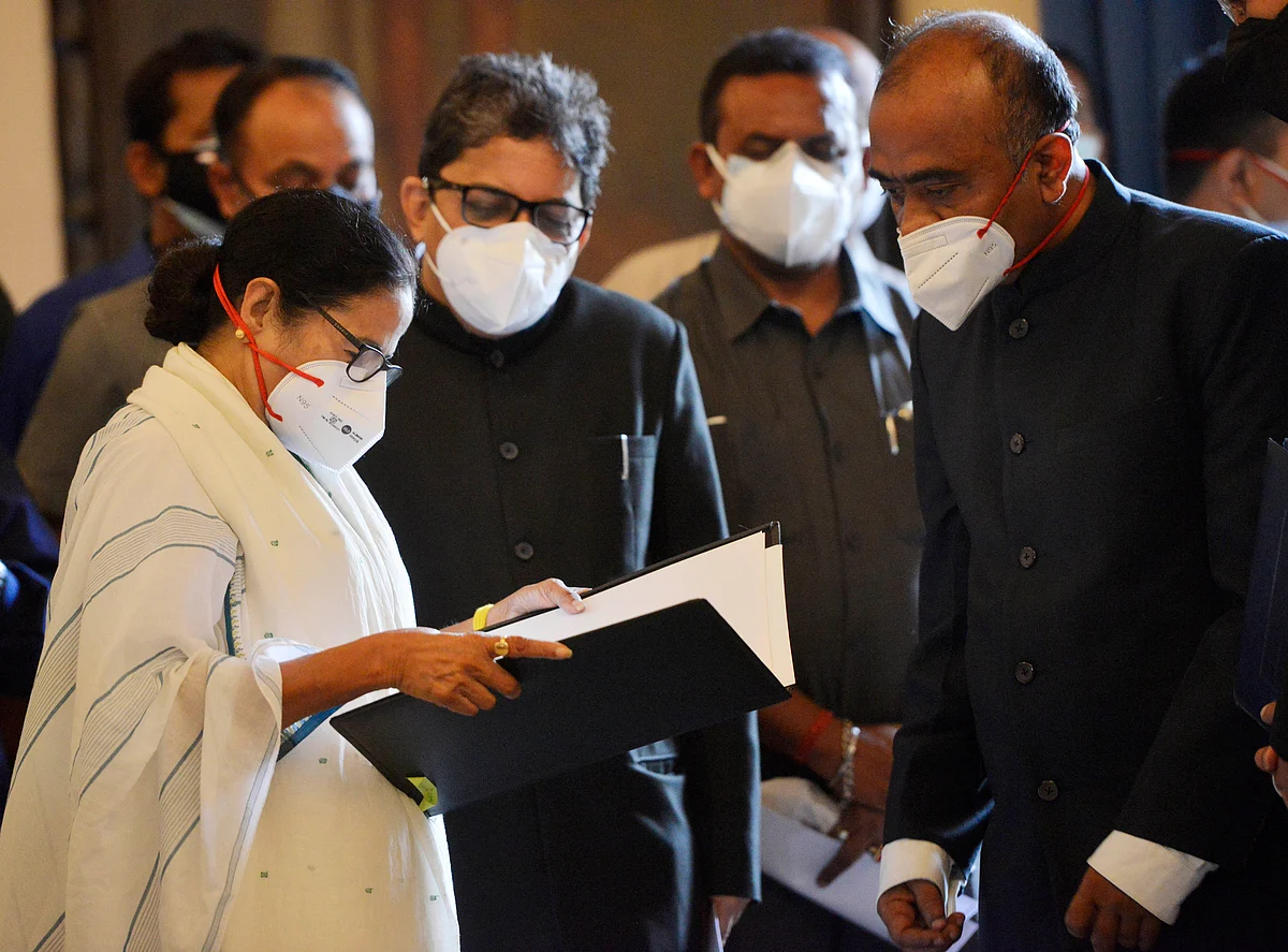 TMC supremo Mamata Banerjee before taking oath as Chief Minister of West Bengal for a third consecutive term, at Raj Bhavan in Kolkata on Wednesday. She was administered the oath by Governor Jagdeep Dhankhar.