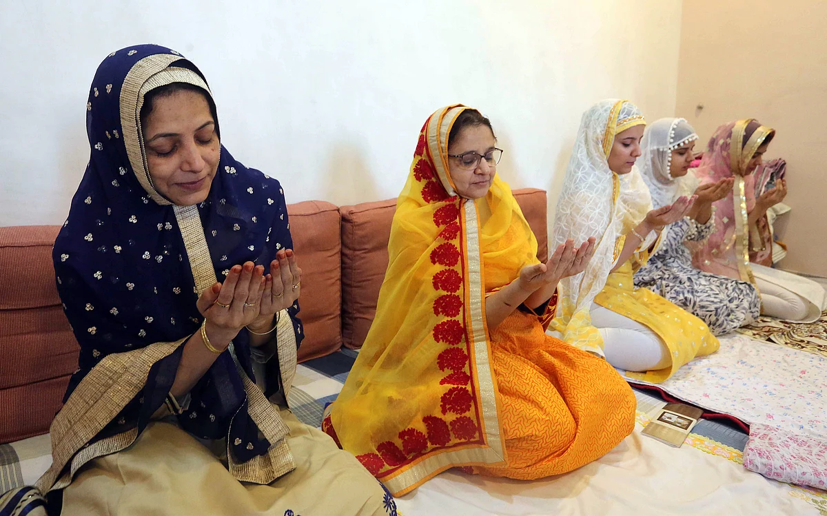 Devotees of Dawoodi Bohra Community offer Namaz at their homes on the occasion of Eid-ul-Fitr festival during lockdown imposed to curb the spread of COVID-19, in Bhopal.