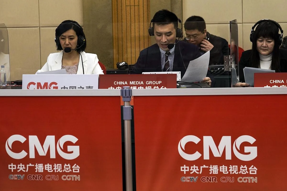 China's state broadcaster CCTV news broadcasters read news at a media centre during a news conference on the eve of the annual legislature opening session in Beijing on March 4, 2021. Israel's Embassy in China is protesting what it describes as
"blatant anti-Semitism" on a program run by the overseas channel of state broadcaster CCTV discussing the ongoing violenc
Gaza and elsewhere.