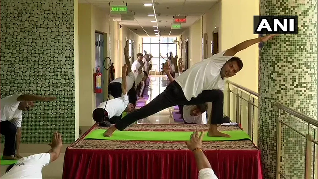 West Bengal: BSF (Border Security Force) personnel perform Yoga at BSF Camp in Kolkata on International Yoga Day.